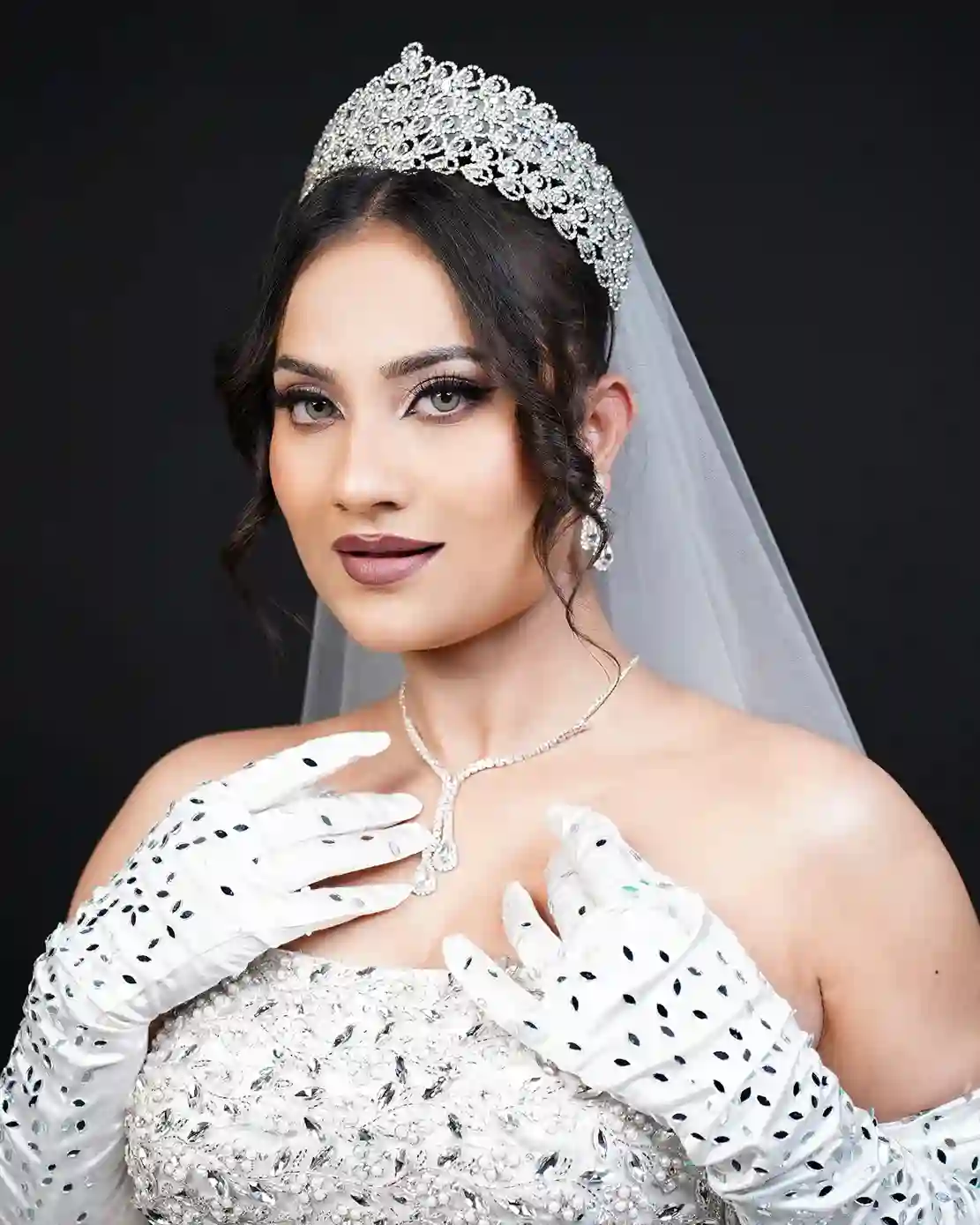 Bride in white gown with tiara